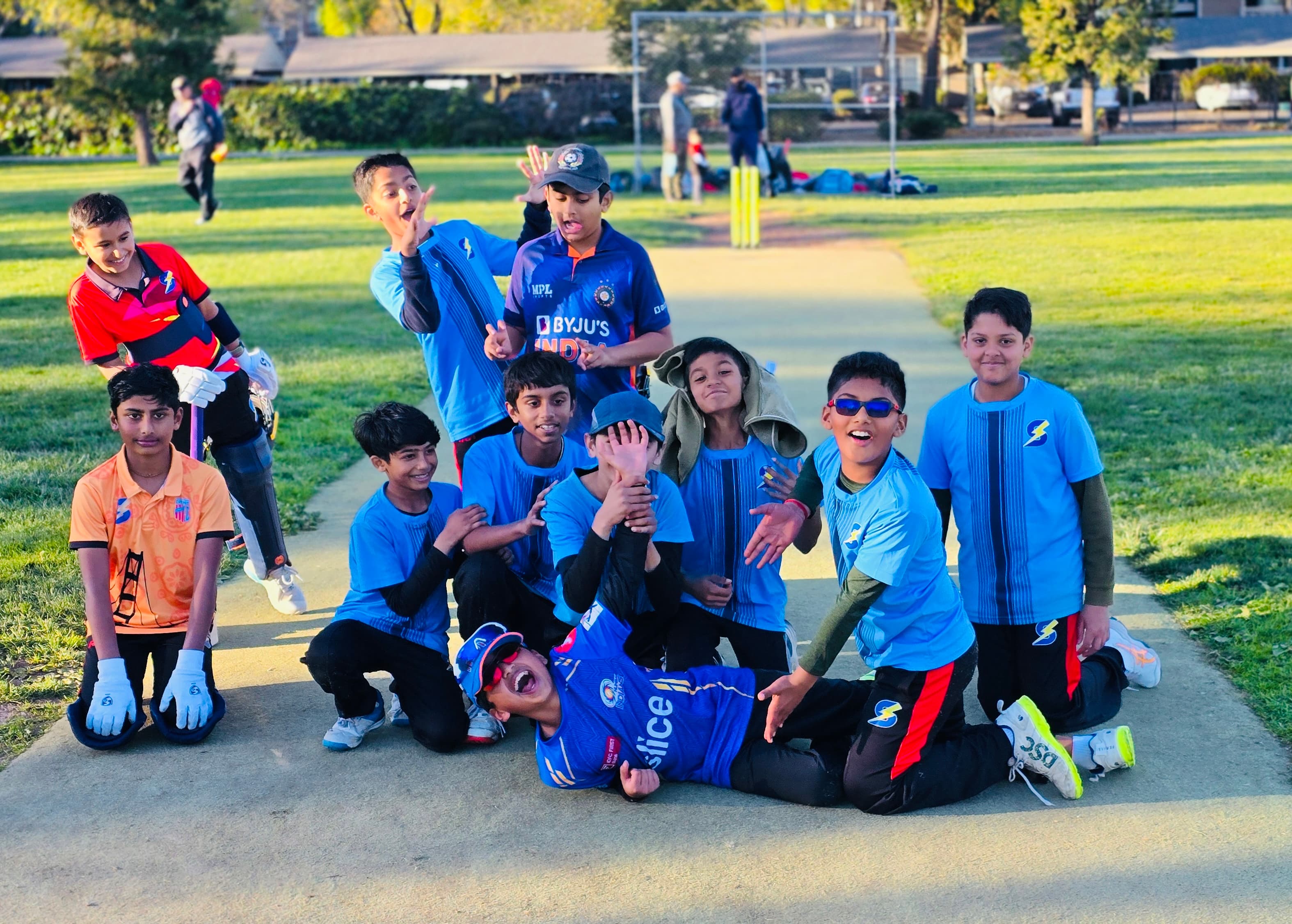Strikers kids celebrating after a game